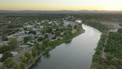 Sticker - Aerial view of a river landscape at dusk in Colusa, California