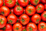 Fototapeta Kuchnia - Full frame background pattern of fresh tomatoes, close up, high angle view