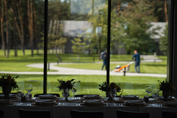 Wall Mural - View of the lawn through the window of the banquet hall