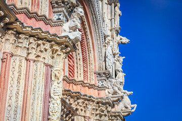 Wall Mural - Medieval ancient and ornate cathedral at clear sky, Tuscany, Italy