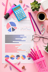 Poster - Business charts, cup of coffee and stationery on pink background