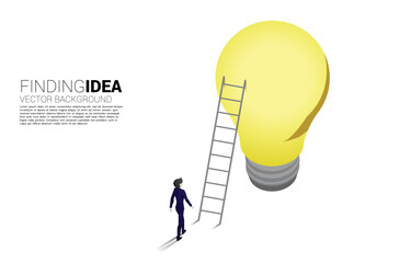 Poster - Silhouette of businessman walking to ladder to light bulb . Business Concept of creative idea and solution.