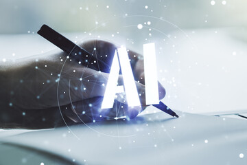 Poster - Creative artificial Intelligence symbol concept with man hand writing in notebook on background. Multiexposure