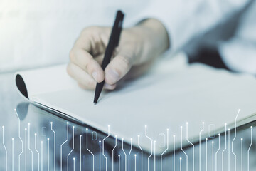 Poster - Creative concept of microscheme illustration and man hand writing in notebook on background. Big data and database concept. Multiexposure