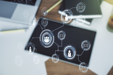 Poster - Social network media concept and modern digital tablet on desktop on background, top view. Double exposure