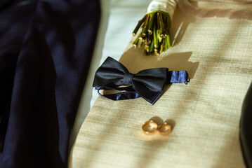 The groom's fees, jacket and watch