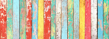 Texture Of Vintage Wood Boards With Cracked Paint Of White, Red, Yellow, Cyan And Blue Color
