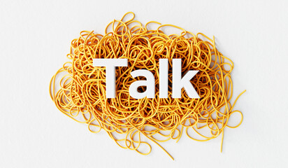 Wall Mural - Talk word on a tangled pile of string. mental health and problem solving concept. 3D Rendering