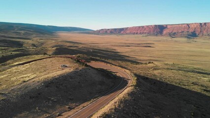 Canvas Print - Road across the canyon mountains, aerial view from drone.