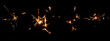 Set of festive sparkler with sparks on black background for overlay blending mode for holiday design projects.