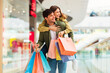 © Prostock-studio - Couple Having Fun Shopping Together With Shopper Bags In Hypermarket