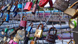 © Pluto119 - Love Lock Padlocks on Bridge with Lovers and friends initials on it in romantic gesture