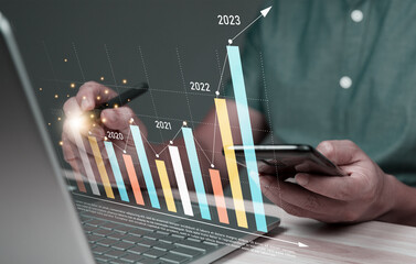 business finance technology and investment concept. Stock Market Investments Funds and Digital Assets. businessman analysing forex trading graph financial data. Business finance background.