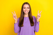 Photo of attractive charming peaceful businesswoman wear trendy pullover toothy smiling showing v-sign popular symbol isolated on yellow color background