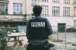 © Amparo Garcia - Photoreporter on his back with bulletproof vest