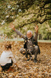 © BGStock72 - Grandfather spending time with his granddaughter in park on autumn day