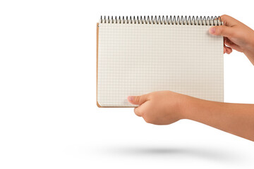 Wall Mural - Empty notepad in hand. A hand holds a blank notepad with copy space, isolated on a white background.