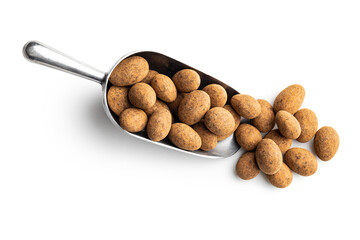 Poster - Almonds in chocolate coated in cocoa isolated in scoop on white background.