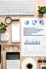 Poster - Business charts, mobile phone and stationery on beige background