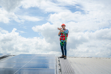 Aufkleber - Solar power,Engineer inspect solar panels on the roof of a factory where solar panels are installed using solar energy.