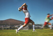 Training, man and soccer ball throw on soccer field during game or competition outdoor. Sports, fitness and football player pitching ball during practice, exercise or workout session on grass field