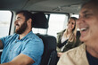 © Allistair F/peopleimages.com - Family, travel and road trip with a man driving a car on holiday or vacation with his relatives as a passenger. Transport, driver and journey with a group of happy people traveling together