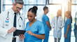 © Anela R/peopleimages.com - Doctor, healthcare and research with nurse on tablet in collaboration for diagnosis or prescription at the hospital. Medical GP and employee working together on touchscreen for patient clinic history