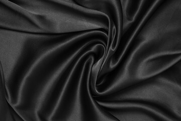 Wall Mural - Black fabric texture background, wavy fabric slippery black color, luxury satin cloth texture.