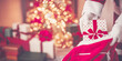 © candy1812 - View of hands of Santa Claus with giftbox in his hans indoors.