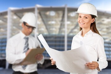 Professional engineer workers posing on the construction site