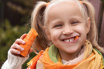 Wall Mural - Bio Vegetable for Children. Fresh Healthy Organic Food for small Kids. Cute Little Girl Child eating Fresh Eco  Carrot. 