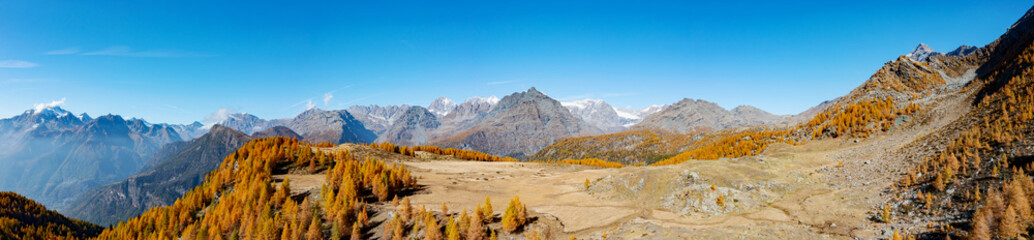 autumnal view of Valmalenco in the Acquanegra alpe area, Italy