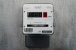 Electricity meter on concrete wall - 3D illustration