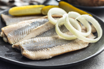 Wall Mural - Marinated herring fish on plate.