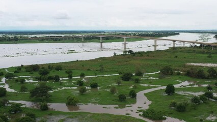 Wall Mural - Flooded area around the Roncador bridge as a result of the overflow of the Magdalena River. Colombia.