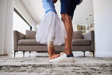 Feet, Dance And Girl Dancing With Father In A Living Room, Love And Family Fun In Their Home Together. Shoes, Happy Family And Parent Teaching Child Dancer, Loving And Caring Support By Single Dad