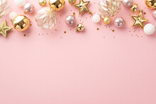 Christmas Tree Decorations Concept. Top View Photo Of Stylish Balls White Transparent Pink Baubles Gold Star Ornaments And Shiny Confetti On Isolated Pastel Pink Background With Copyspace