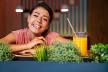 Young Woman Having A Good Morning Healthy Smoothie Drink Made Of Super Foods. People Health Concept