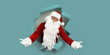 © ZaStock - Emotianal Santa Clause spread arms in different directions through paper hole. Advertisement concept