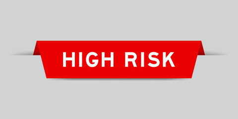 Sticker - Red color inserted label with word high risk on gray background