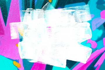 closeup of colorful teal, pink, blue urban wall texture with white white paint stroke. modern patter