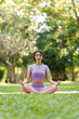 © NanSan - Pretty slim perfect body asian women wear sportswear to playing basic yoga compose.