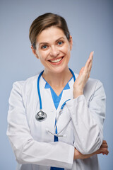 Wall Mural - Smiling young doctor woman isolated close up face portrait.