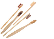 Eco Wooden Toothbrushes Isolated On A White Background, Top View. Bamboo Toothbrushes.