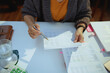 © Alliance - tax time. accountant woman working with documents