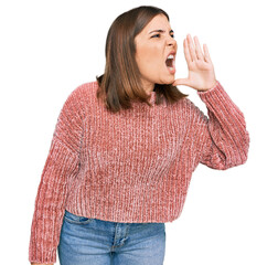 Canvas Print - Young beautiful woman wearing casual clothes shouting and screaming loud to side with hand on mouth. communication concept.