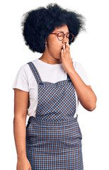 Poster - Young african american girl wearing casual clothes bored yawning tired covering mouth with hand. restless and sleepiness.