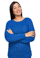 Poster - Young hispanic woman wearing casual clothes happy face smiling with crossed arms looking at the camera. positive person.