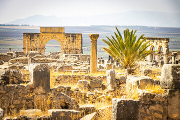 roman ruins, arches, pillars, volubilis, morocco, north africa, columns