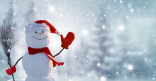 Happy Snowman With Scarf And Cowboy Hat, Standing In Winter Christmas Landscape.Snow Background